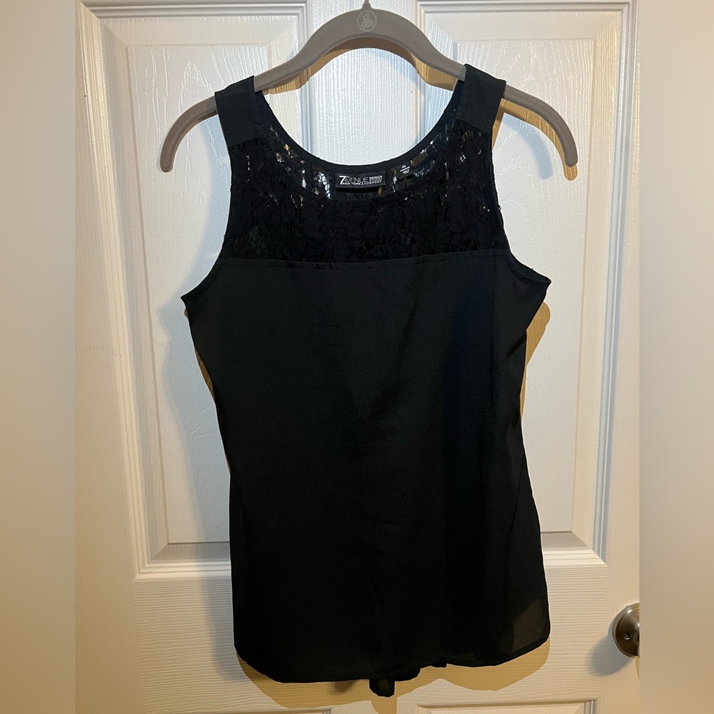 Black sleeveless blouse